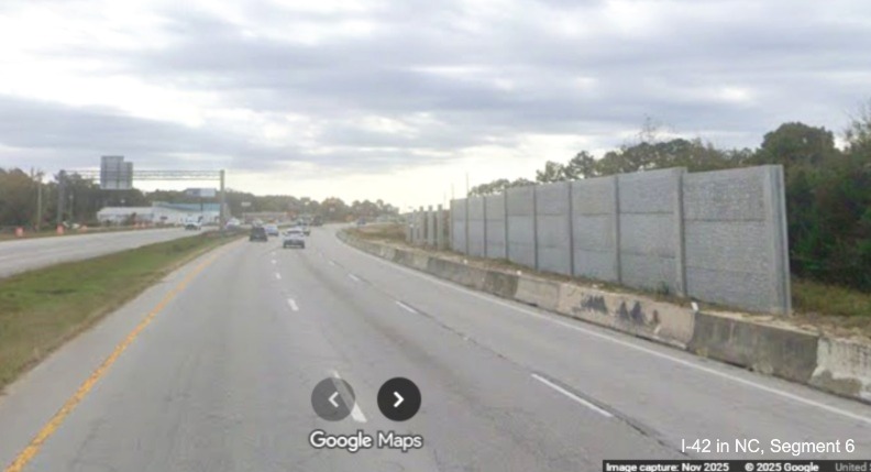 Image of noise wall construction along US 70 East in James City construction zone, 
		Google Maps Street View, November 2025