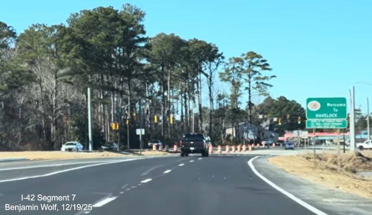 Image of Welcome To Havelock sign at end of US Business 70 West ramp from
	US 70 (Future I-42) West at the east end of the Havelock Bypass, Screen grab from Benjamin Wolf video, December 2025