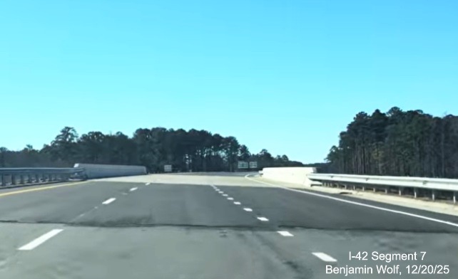 Image of first East US 70 reassurance maker on the US 70 (Future I-42) 
	East Havelock Bypass, Screen grab from Benjamin Wolf video, December 2025