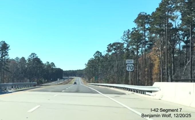 Image of East 70 reassurance marker at the start of the eastbound Future I-42 
	Havelock Bypass, Screen grab from Benjamin Wolf video, December 2025