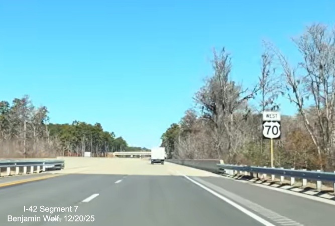 Image of West US 70 reassurance marker after the Lake Road exit on US 70 (Future 
	I-42) West Havelock Bypass, Screen grab from Benjamin Wolf video, December 2025