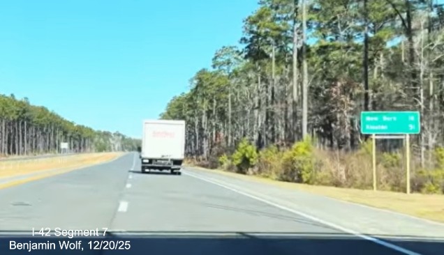 Image of post-interchange distance sign after the Lake Road exit on US 70 (Future 
	I-42) West Havelock Bypass, Screen grab from Benjamin Wolf video, December 2025