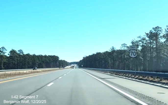 Image of East US 70 reassurance marker after the Lake Road exit on the US 
	70 (Future I-42) East Havelock Bypass, Screen grab from Benjamin Wolf video, December 2025
