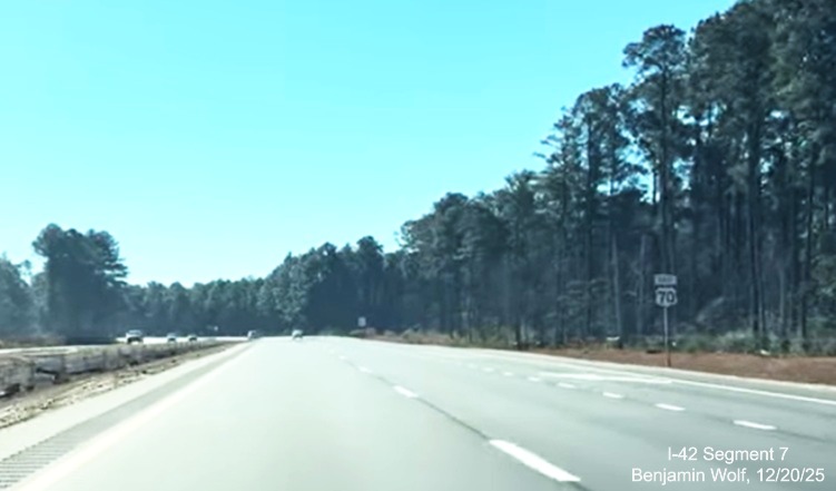 Image of East US 70 reassurance marker prior to the end of interstate standard 
	roadway after the end of the US 70 (Future I-42) East Havelock Bypass, Screen grab from Benjamin Wolf video, December 2025