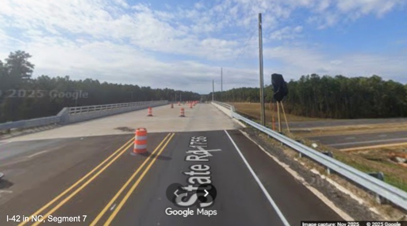 Image of Lake Road crossing completed bridge over the future I-42 Havelock Bypass, 
	Google Maps Street View, November 2025