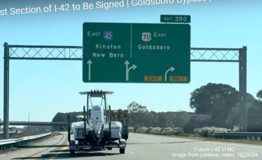 Image of overhead APL ramp sign for US 70 East exit on I-42 East/Goldsboro Bypass, from jcil4ever video, 
      October 2024