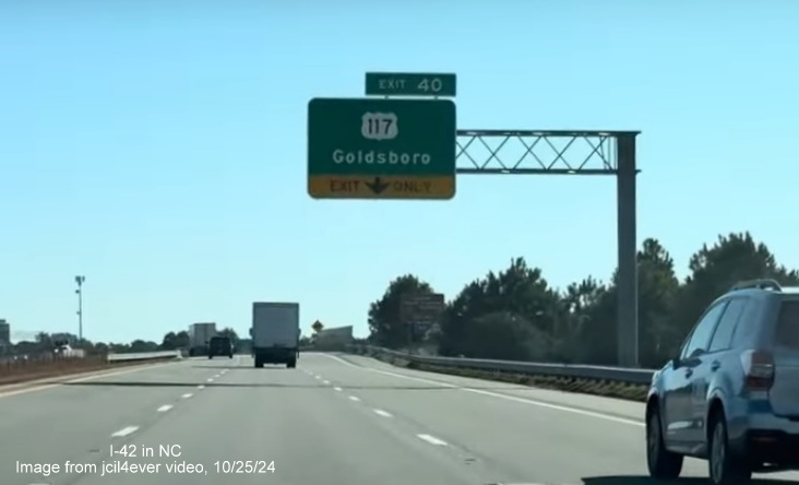 Image of renumbered exit sign for US 117 exit on I-42 East/Goldsboro Bypass, from jcil4ever video, 
      October 2024