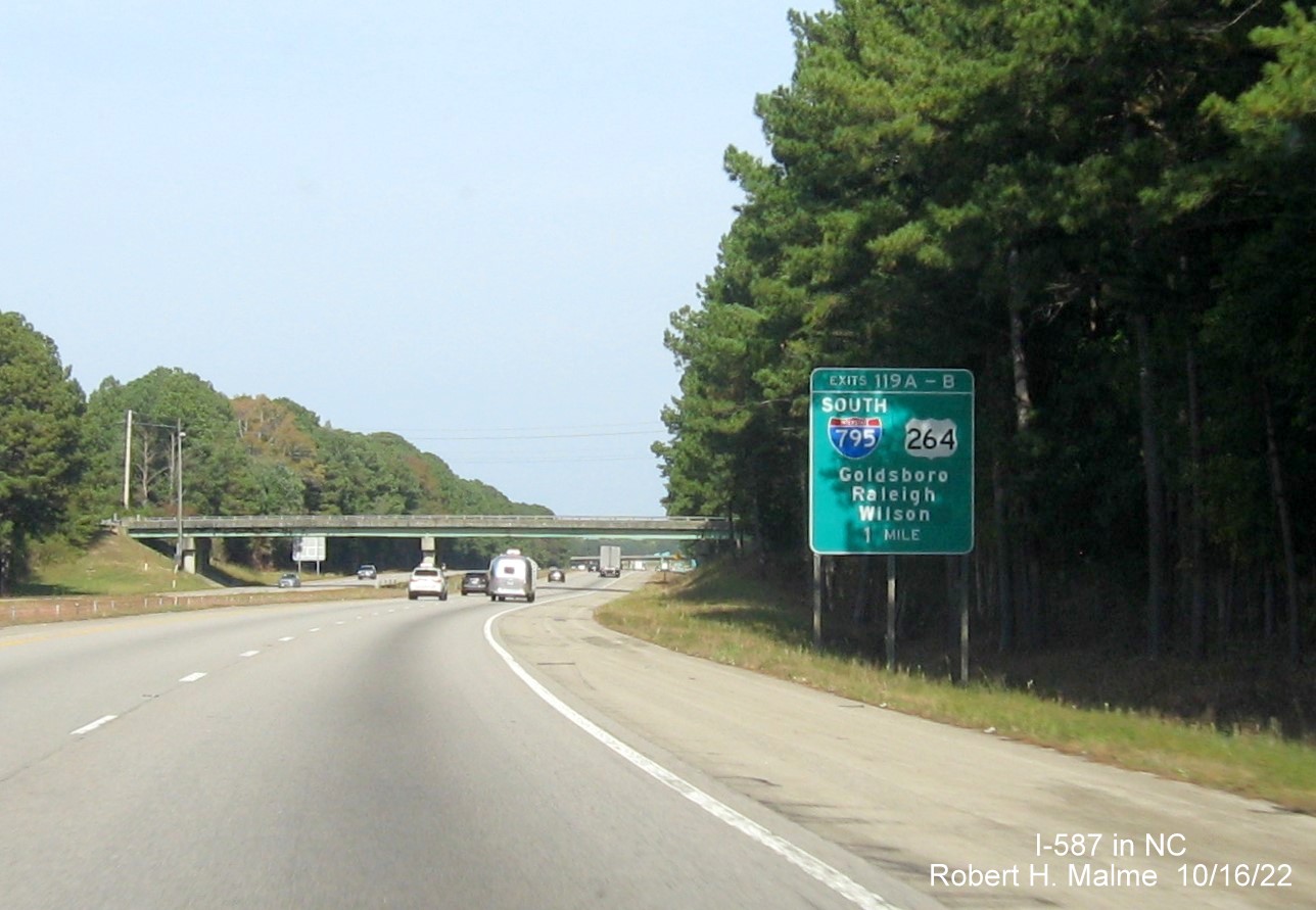 Image of 1 mile advance sign for I-587/I-795/US 264 exit not updated to include I-587 shield on I-95 North 
                                       in Wilson,October 2022