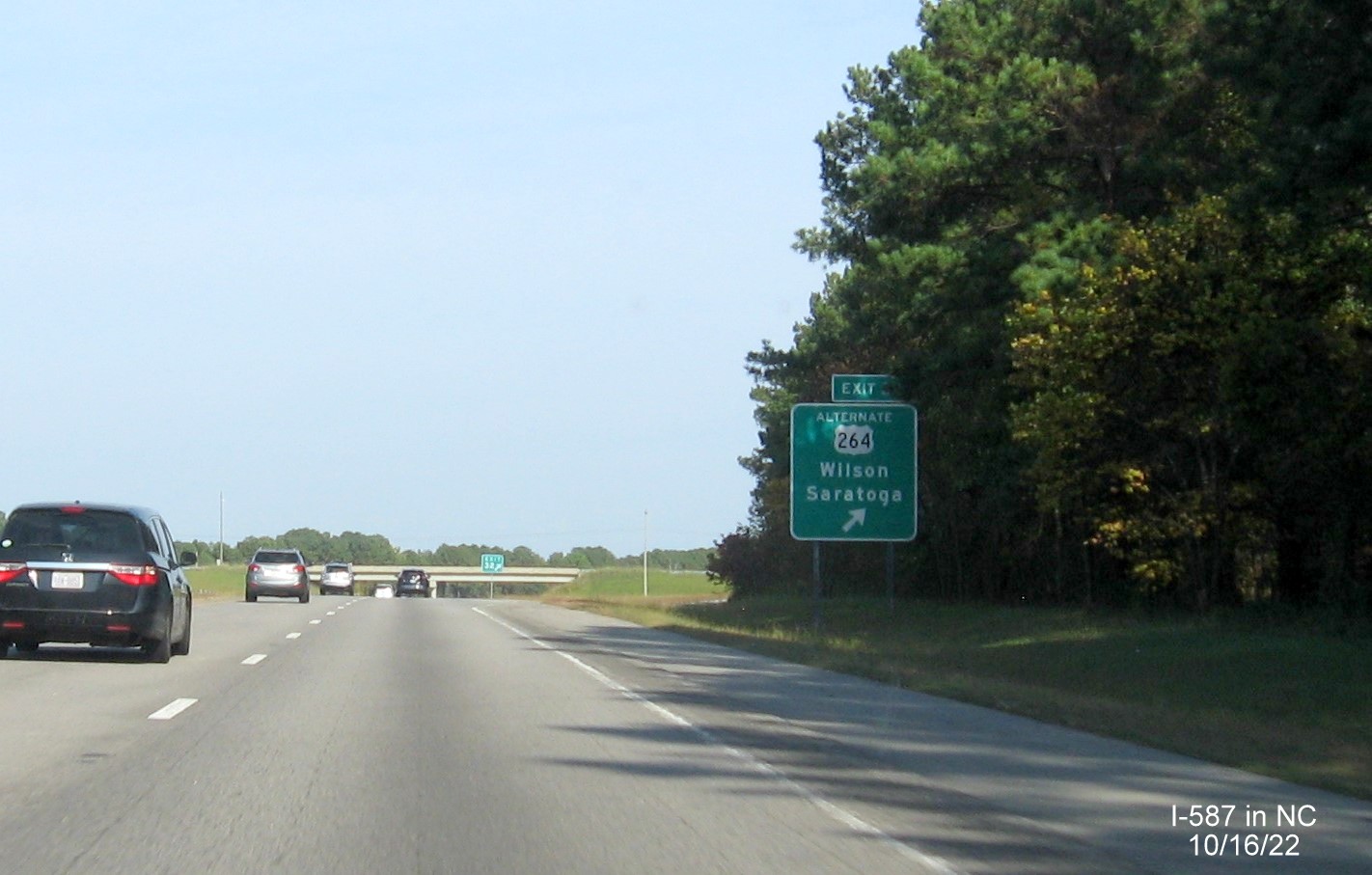 Image of ramp sign for US 264 East exit, still referring to Alt. US 264, with new I-587 milepost exit number on I-587/US 264 East in Saratoga,  October 2022