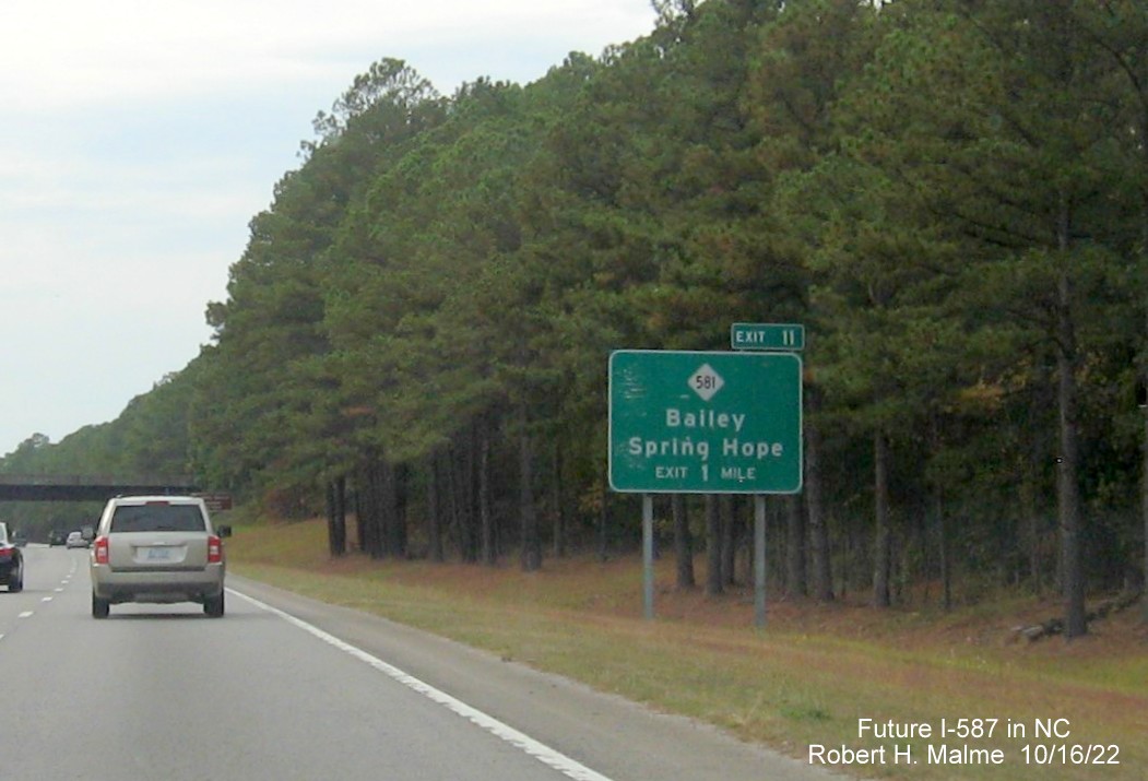Image of 1 mile advance sign for NC 581 exit with new Future I-587 mile exit number on US 264 West in Spring Hope, October 2022