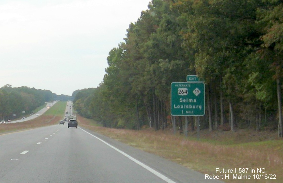 Image of ground mounted 1 mile advance sign for Alt. US 264/NC 39 exit on US 264 West with new Future I-587 mileage exit number, October 2022