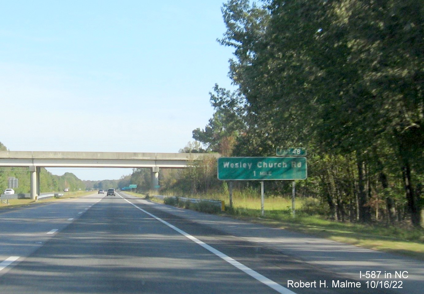 Image of 1 mile advance sign for Wesley Chapel Road (US 258 South) exit with new I-587 milepost exit number on I-587 East in Farmville, October 2022