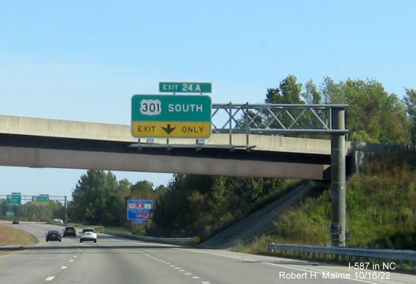 Image of 1/4 mile advance sign for US 301 South exit with new I-587 milepost exit number on I-587/US 264 East in Wilson, October 2022