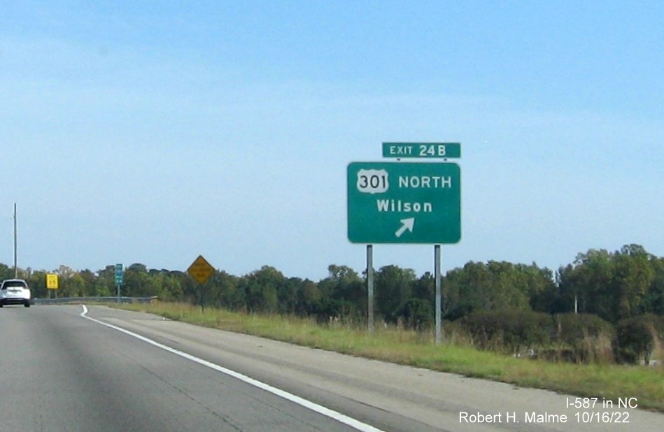 Image of ramp sign for US 301 North exit with new I-587 milepost exit number on I-587/US 264 East in Wilson, October 2022