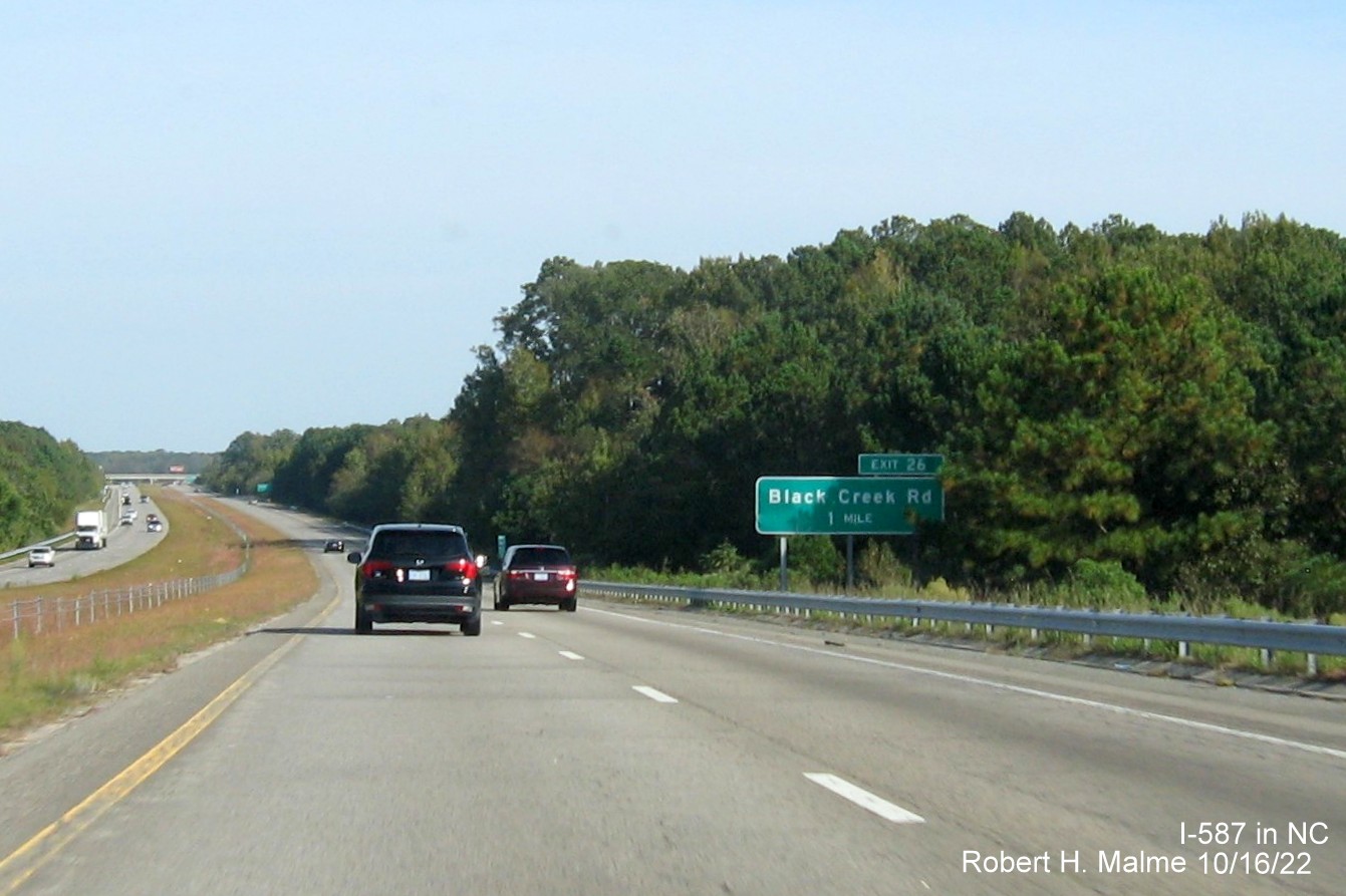 Image of 1 mile advance sign for Black Creek Road exit with new I-587 milepost exit number on I-587/US 264 East in Wilson, October 2022