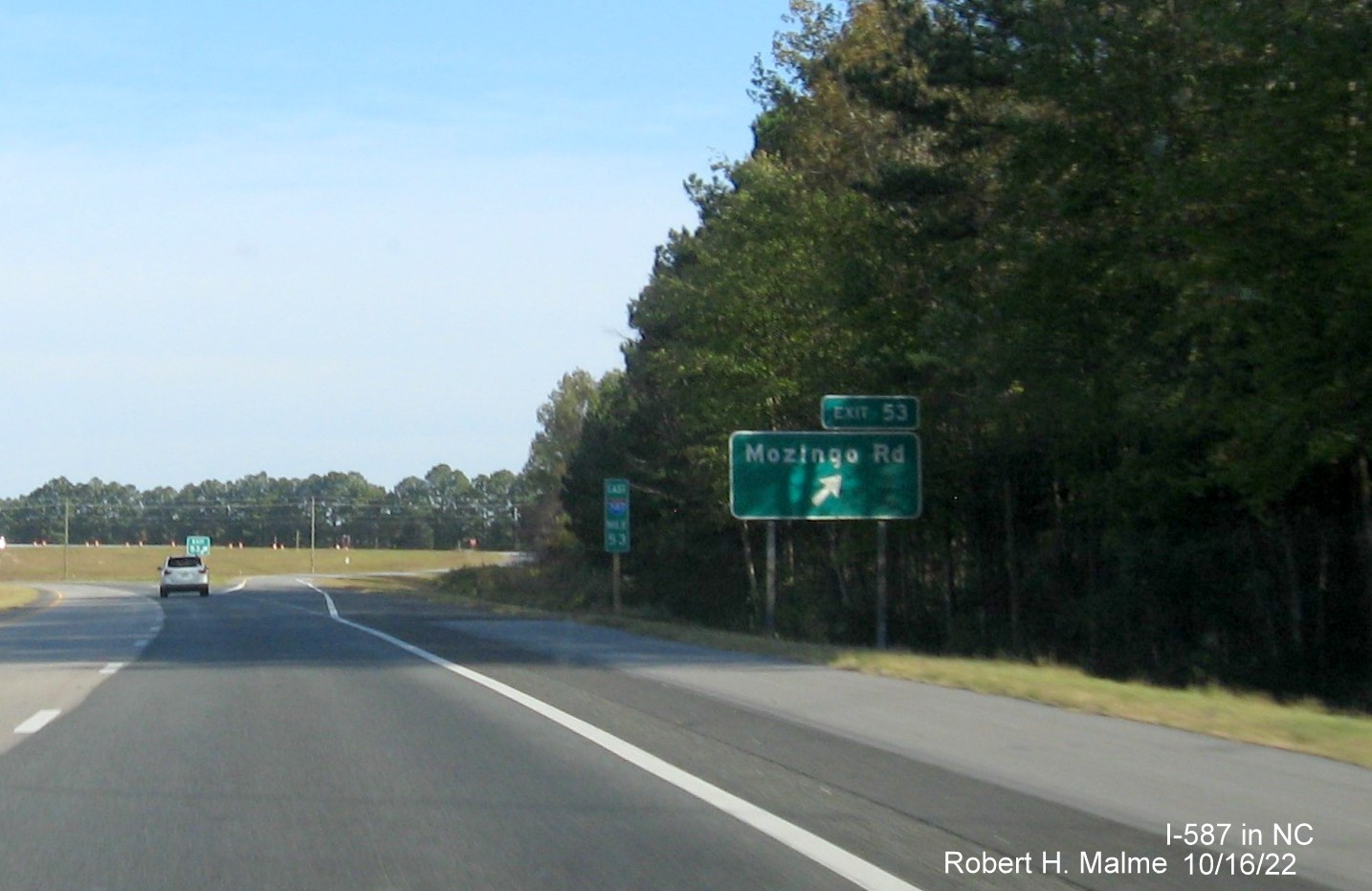 Image of ground mounted ramp sign for Mozingo Road exit with new I-587 milepost exit number on I-587 East in Greenville, October 2022
