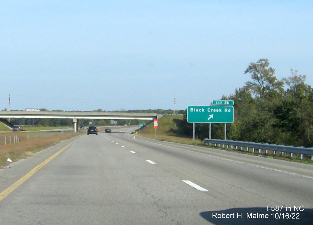 Image of ramp sign for Black Creek Road exit with new I-587 milepost exit number on I-587/US 264 East in Wilson, October 2022