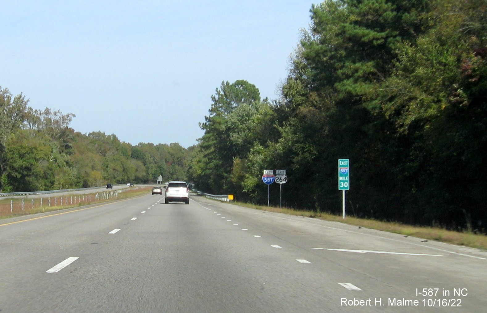Image of ramp sign for US 301 North exit with new I-587 milepost exit number on I-587/US 264 East in Wilson, October 2022