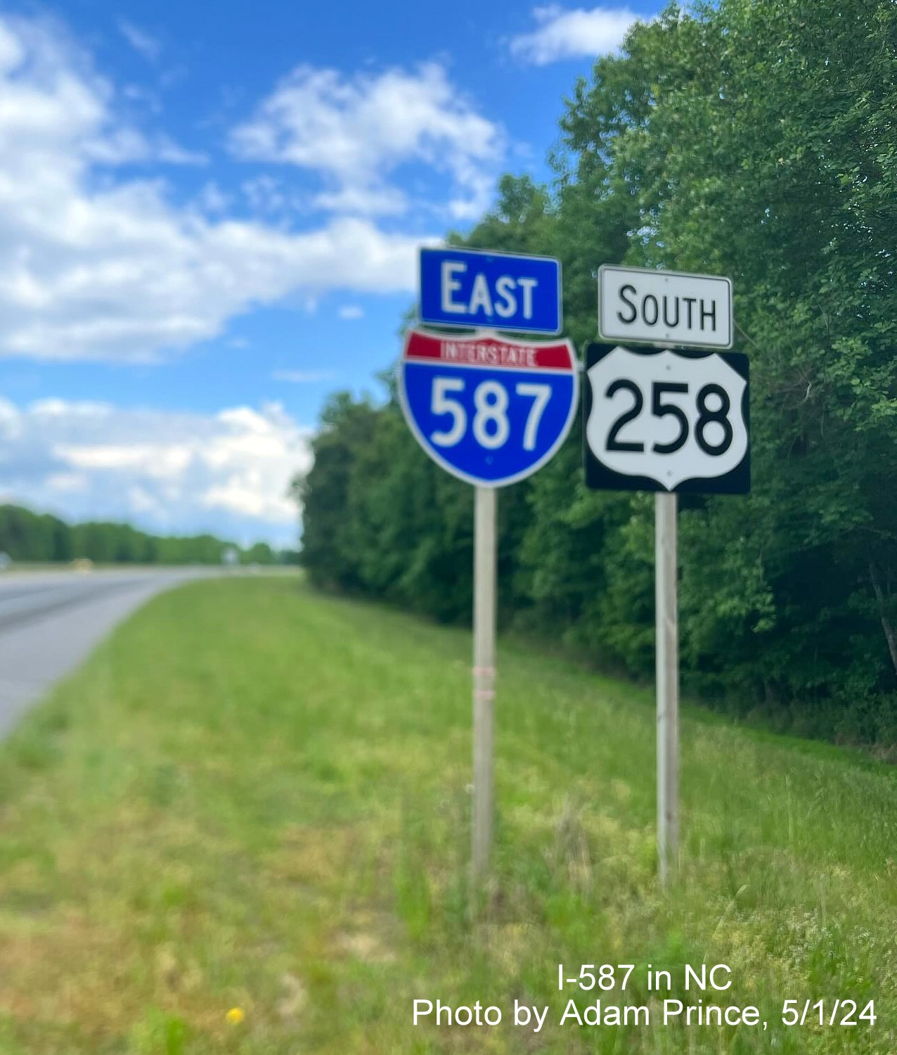 Image of East I-587 reassurance marker in Farmville now with correct blue banner, by Adam Prince, May 2024