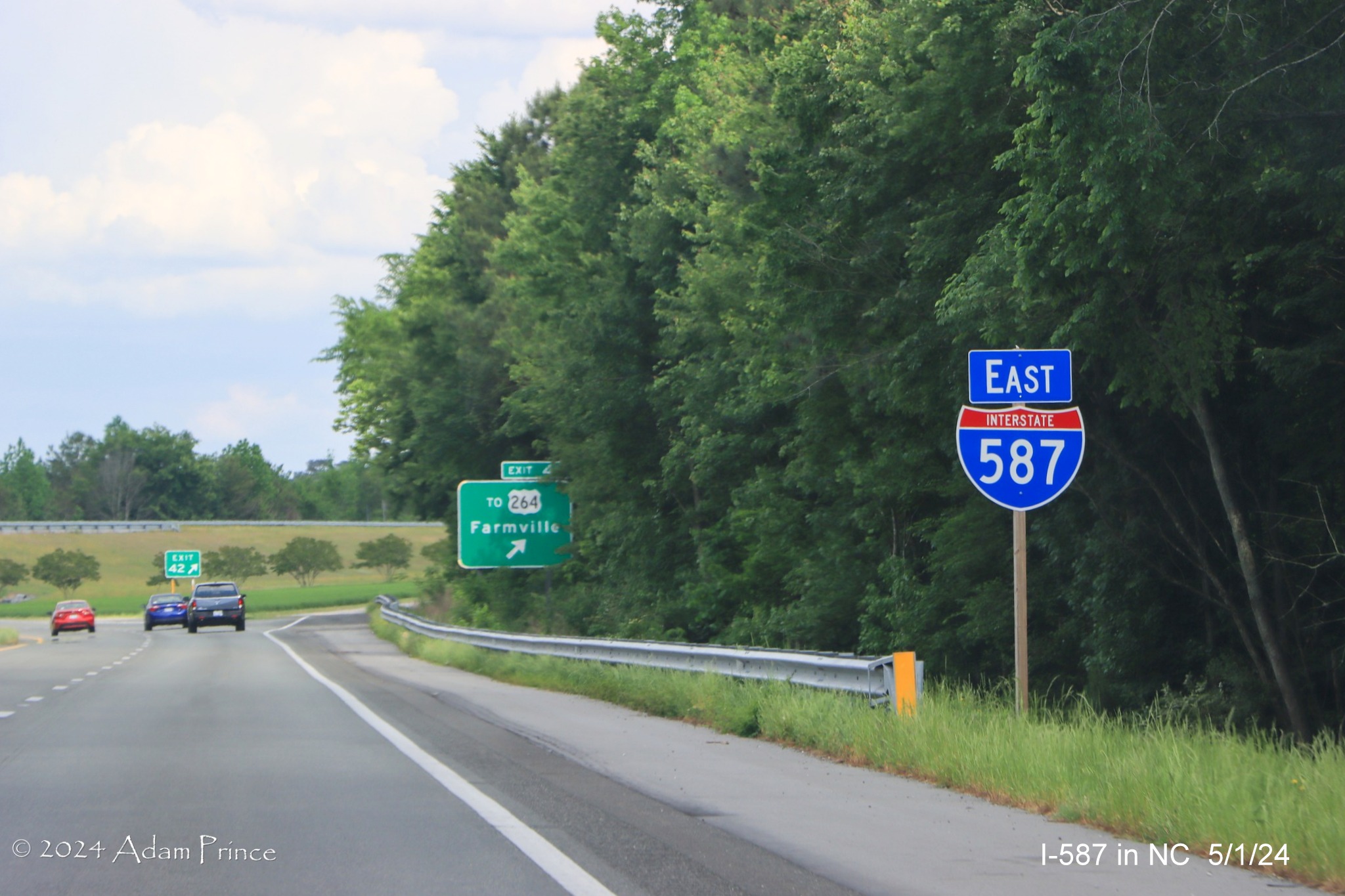 Image of East I-587 reassurance marker in Farmville now with correct blue banner, by Adam Prince, May 2024