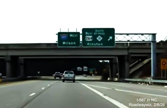 Image of West I-587 pull through sign now in place at US 264/Bypass NC 11 in Greenville, 
	screen grab from Roadwaywiz video, February 2026