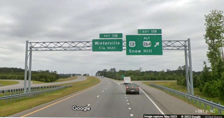 Image of overhead signage at ramp for US 13/ US 264 West/US 264 Alt East exit still not changed to include US 264 shield, Google Maps Street View image, May 2023