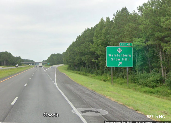 Image of ground mounted ramp sign for NC 91 exit on I-587 West with new I-587 milepost based exit number, Google Maps Street View, August 2022