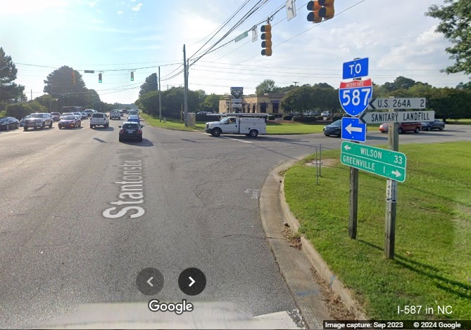 Image of recently placed To I-587 trailblazer at the corner of Stantonsburg Road and Allen Street in Greenville, Google Maps Street View September 2023