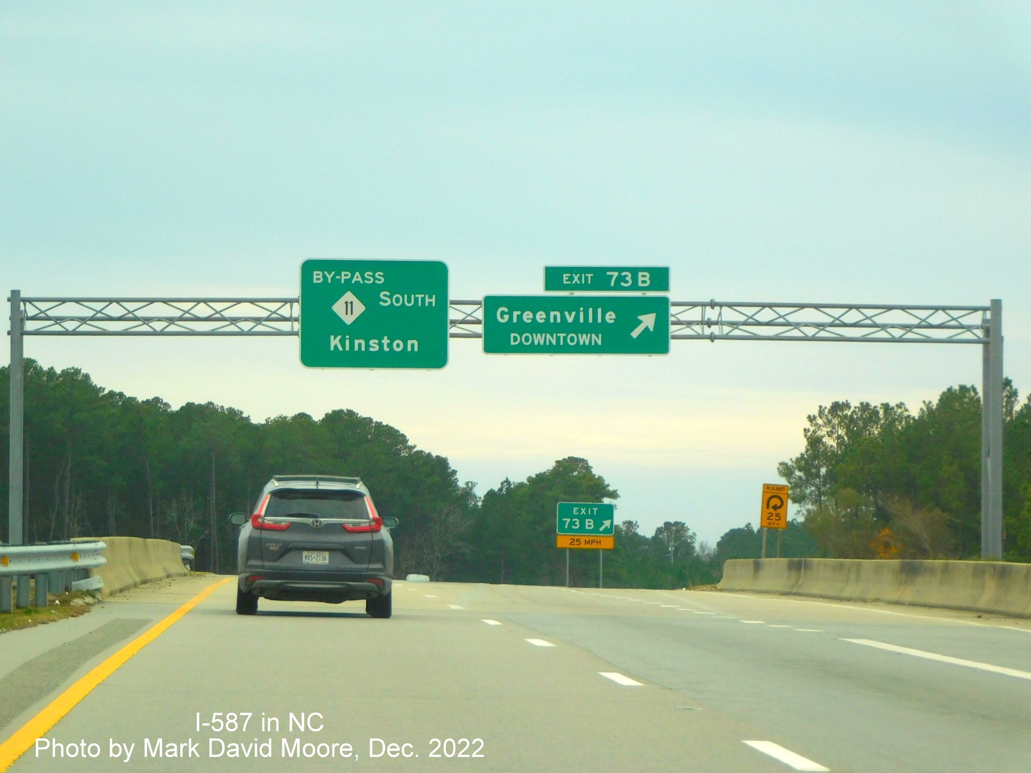 Image of overhead signaage for Downtown Greenville exit on US 264 East/NC 11 Bypass South in Greenville, photo by Mark David Moore, December 2022