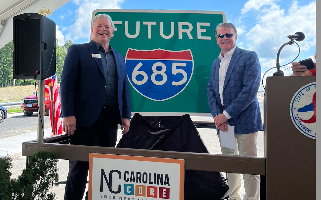 Image of new Future I-685 sign being displayed at NC Core event on 
                                                                            US 421 in Julian, May 2024