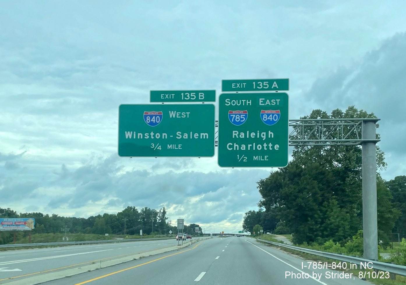 Image of 1/2 and 3/4 mile advance overhead signs for Greensboro Loop exits, now with added I-840 shield after Loop's completion on US 29 North, Strider, August 2023