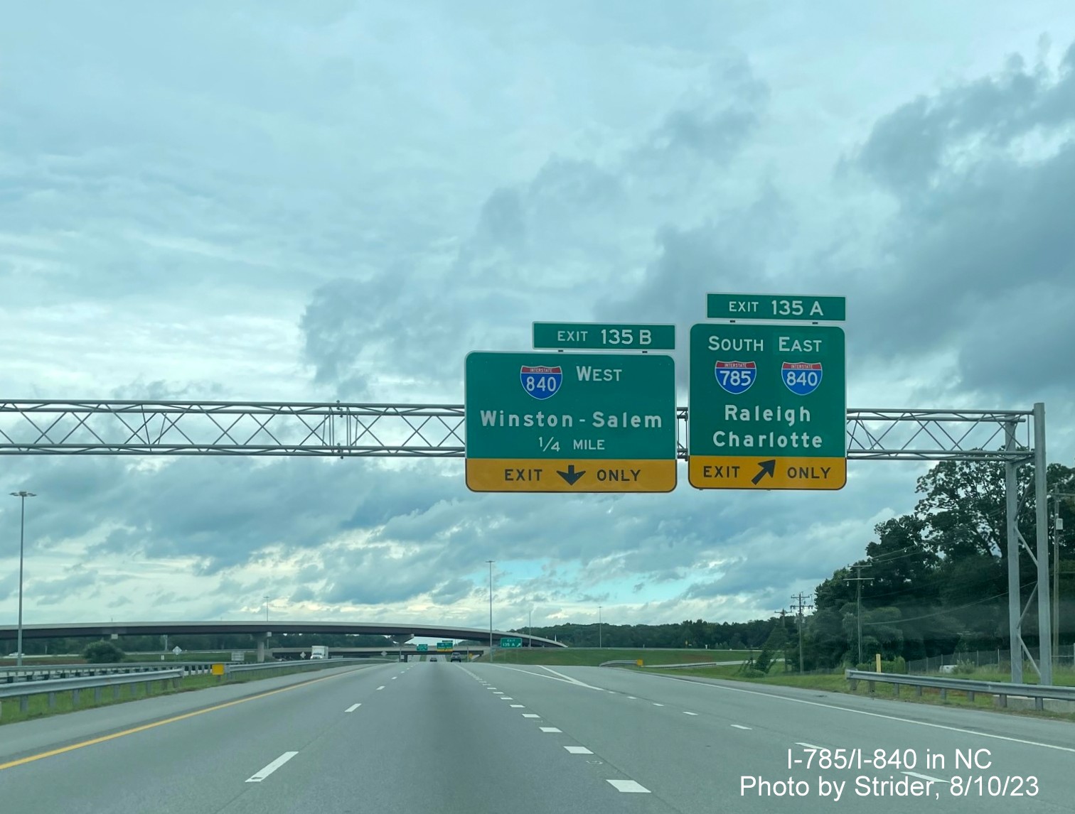 Image of overhead signage at first Greensboro Loop exit, now with added I-840 West advance sign after Loop's completion on US 29 North, Strider, August 2023