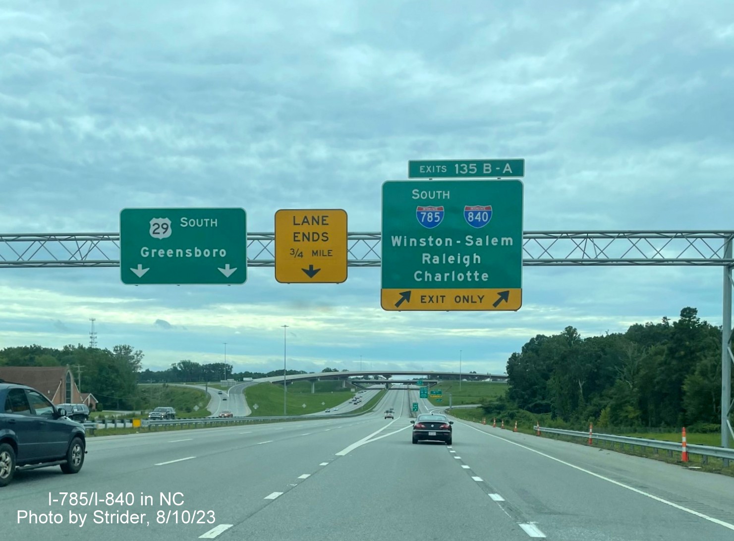 Image of 1 mile advance overhead sign for Greensboro Loop exits, now with added I-840 West sign after Loop's completion on US 29 South, Strider, August 2023
