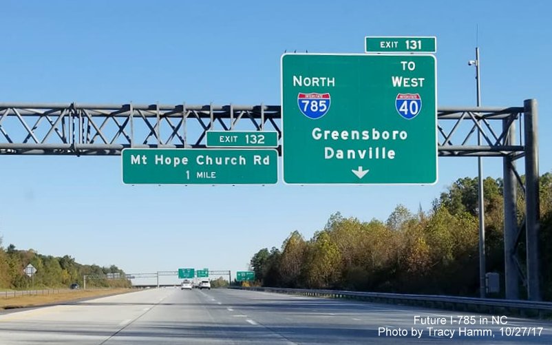 Image of newly installed overhead exit sign with I-785 shield on I-85/Greensboro Loop North prior to I-40 exit, by Tracy Hamm