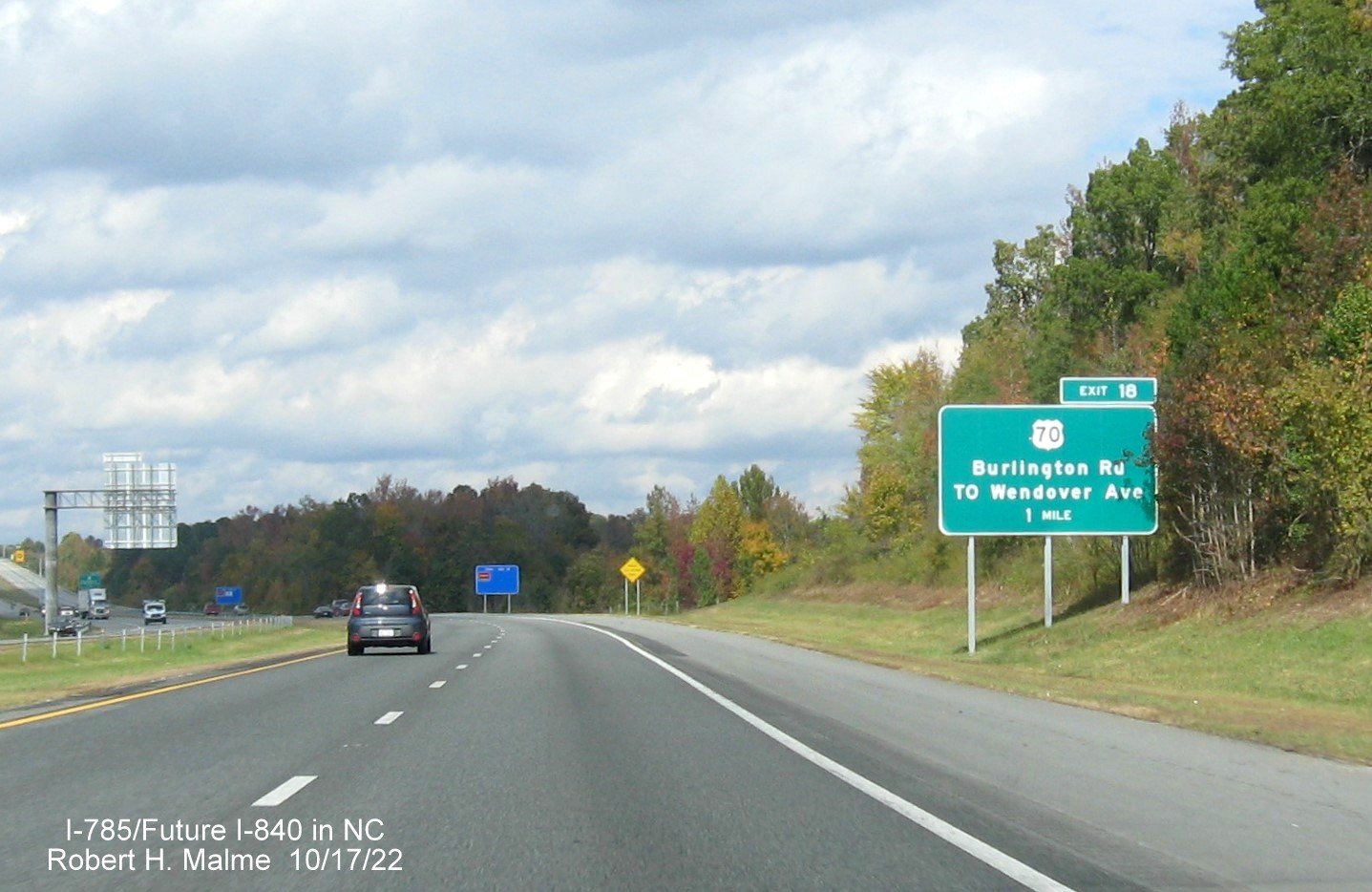 Image of 1 mile advance sign for US 70/Burlington Road exit on I-795 North/Future I-840 West Greensboro 
                  Urban Loop, October 2022