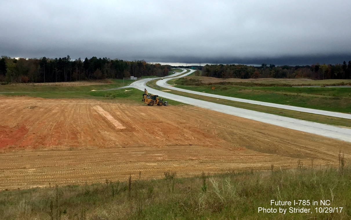 Image of view looking south over soon to be opened I-785/Greensboro Loop heading toward US 70 exit from Huffine Mill Rd, by Strider