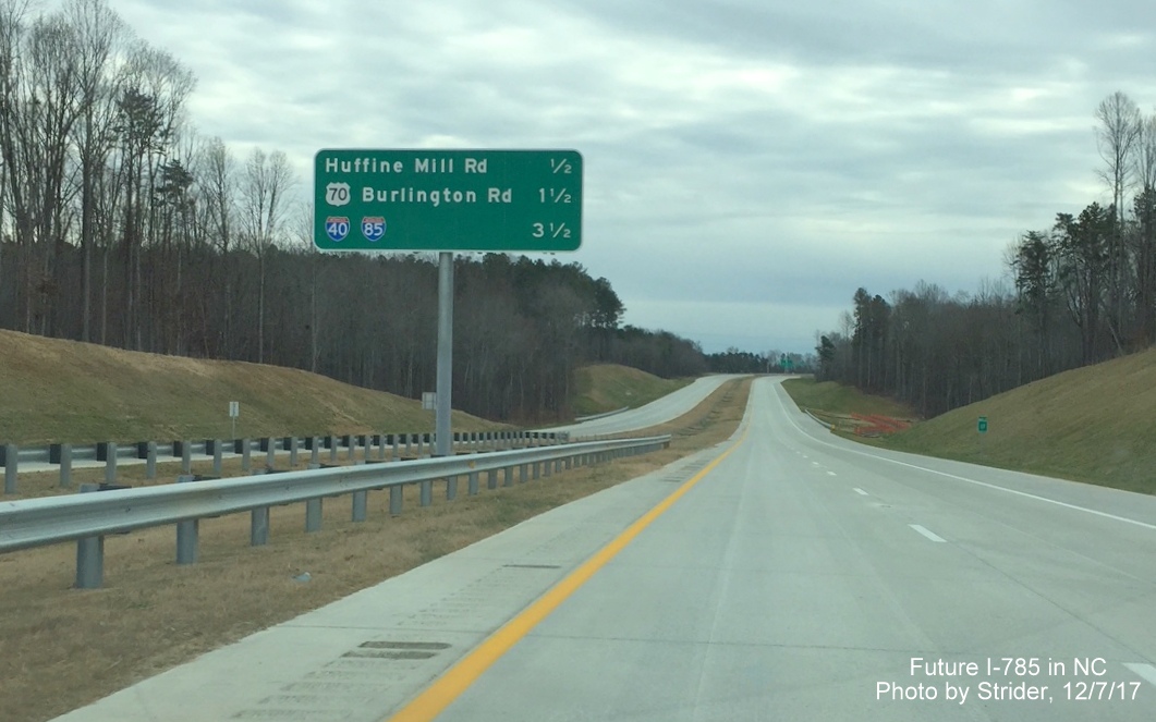 Image of center median interchange mileage sign on I-785/Greensboro Loop South, by Strider