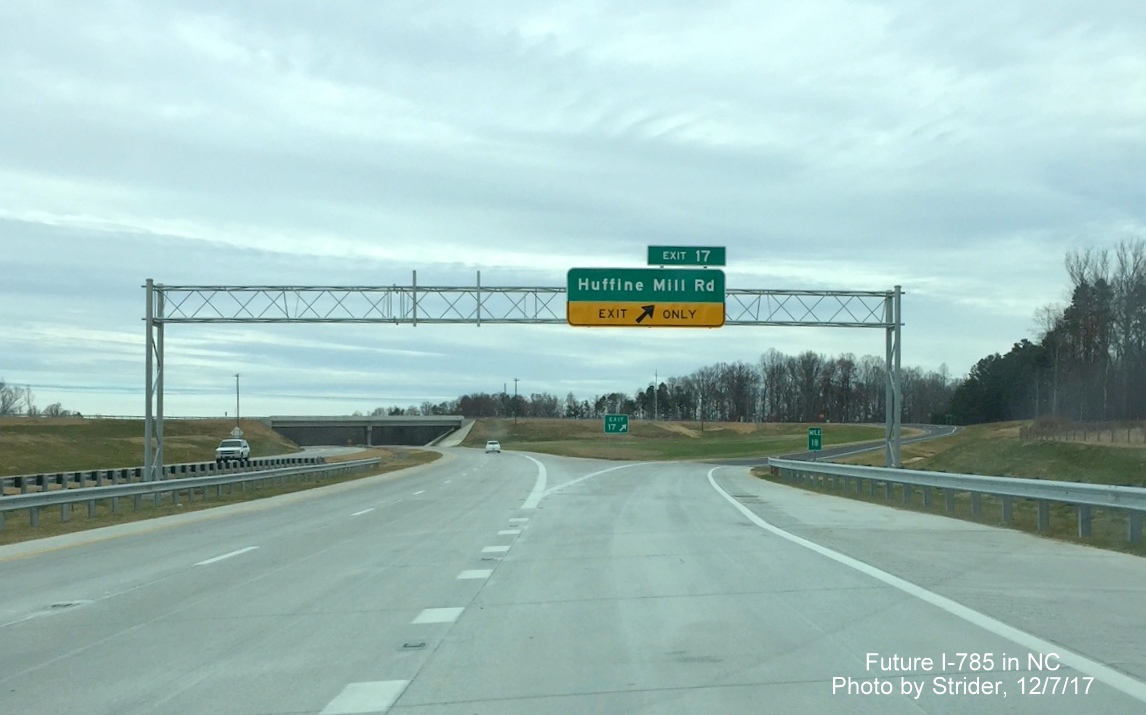 Image of overhead sign and space for future sign prior to Huffine Mill Rd exit on I-785/Greensboro Loop North, by Strider