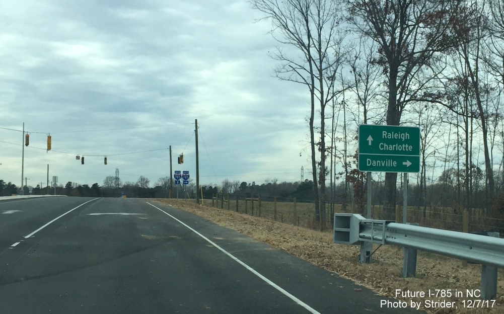Image of guide signs along newly opened off-ramp to Huffine Mill Road from I-785/Greensboro Loop North, by Strider