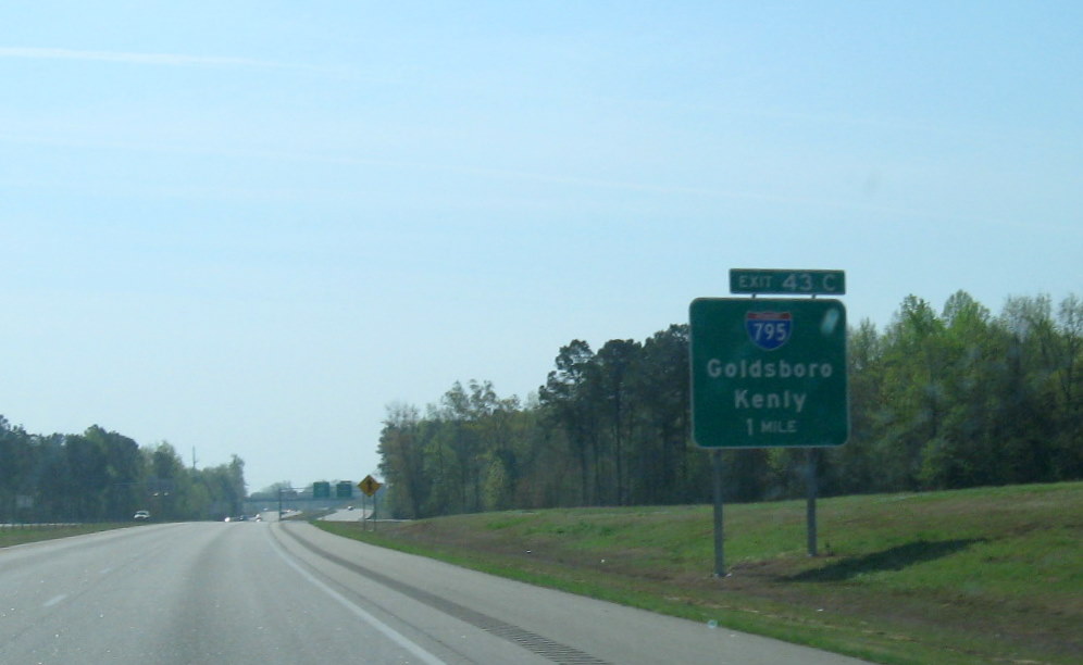 Photo showing former US 117 exit sign on US 264 East changed to I-795 in March 2010
