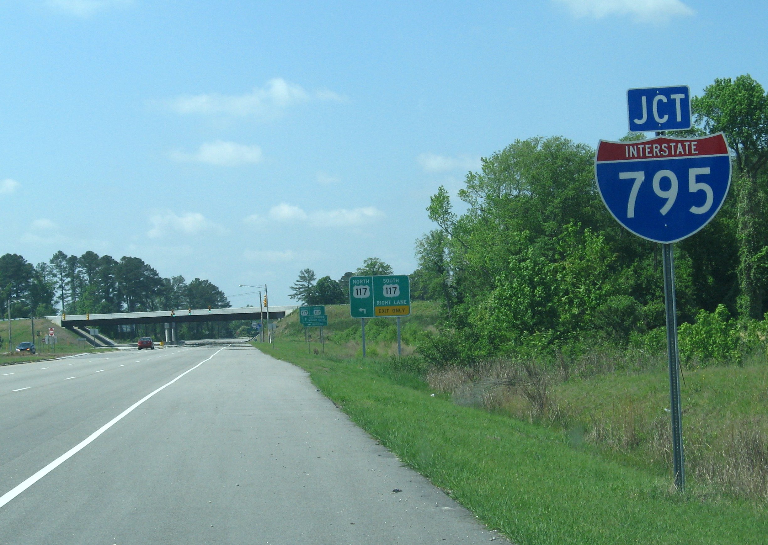 Photo of I-795 interchange signing along US 301 in May 2008