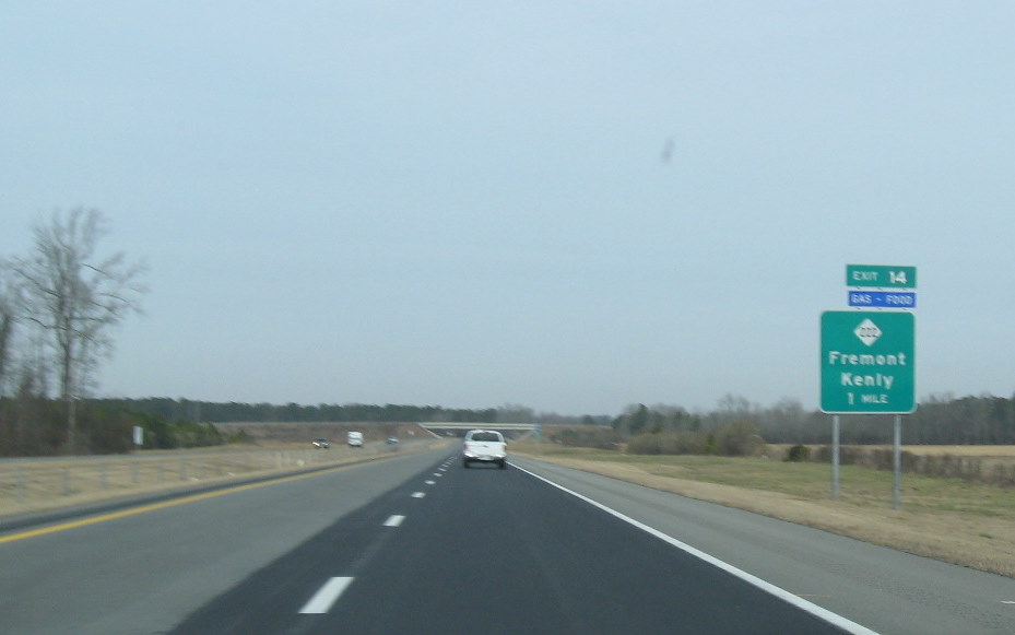 Photo of NC 222 exit signage off of I-795 South showing new Exit number, Jan. 
2010