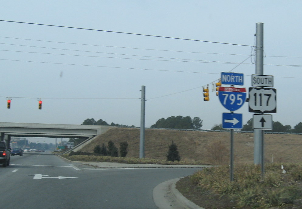 Photo of inconsistent signage along US 70 at southern end of I-795 in 
Goldsboro, Jan. 2010