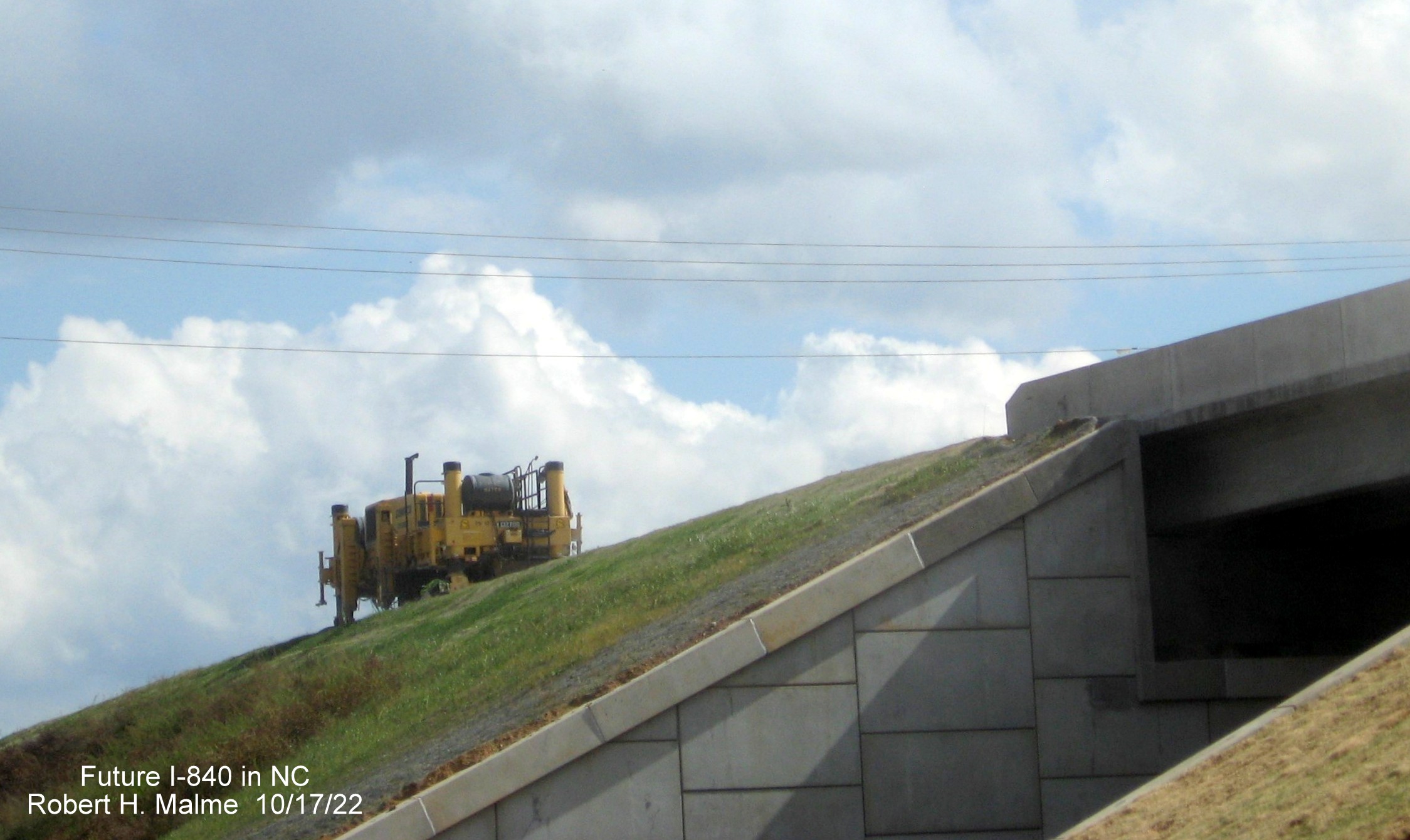 Image of construction equipment along Greensboro Loop near railroad bridge by Hillcroft Road, October 2022