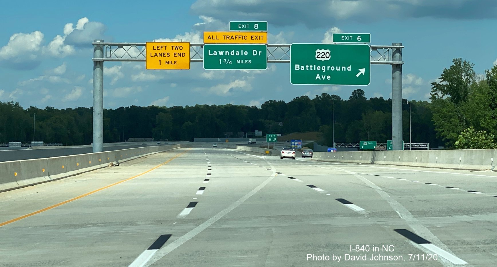 Image of overhead signage at ramp to US 220 Battleground Avenue on I-840 East Greensboro Urban Loop, by David Johnson, July 2020