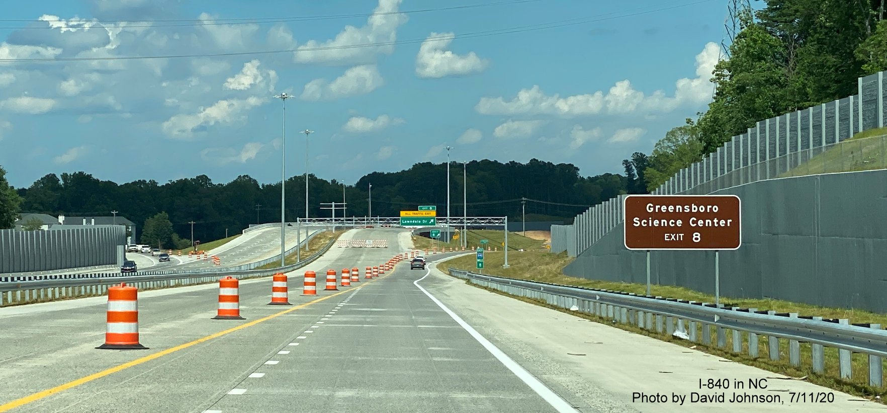 Image of ground mounted and overhead signage at current end of I-840 East Greensboro Urban Loop at Lawndale Drive, by David Johnson July 2020