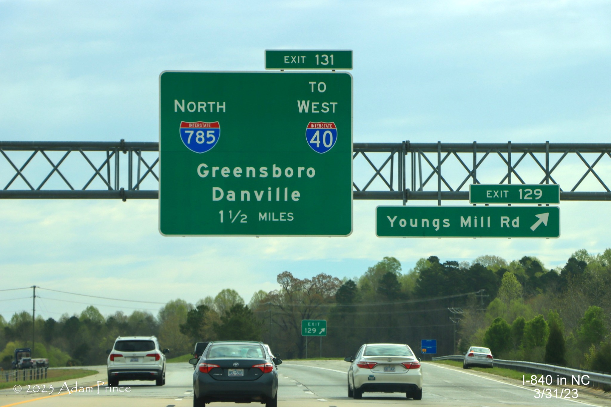 Image of overhead 1 1/2 mile advance sign for northern section of Greensboro Loop on I-85 North still missing 
                                              I-840 shield, Adam Prince,  March 2023