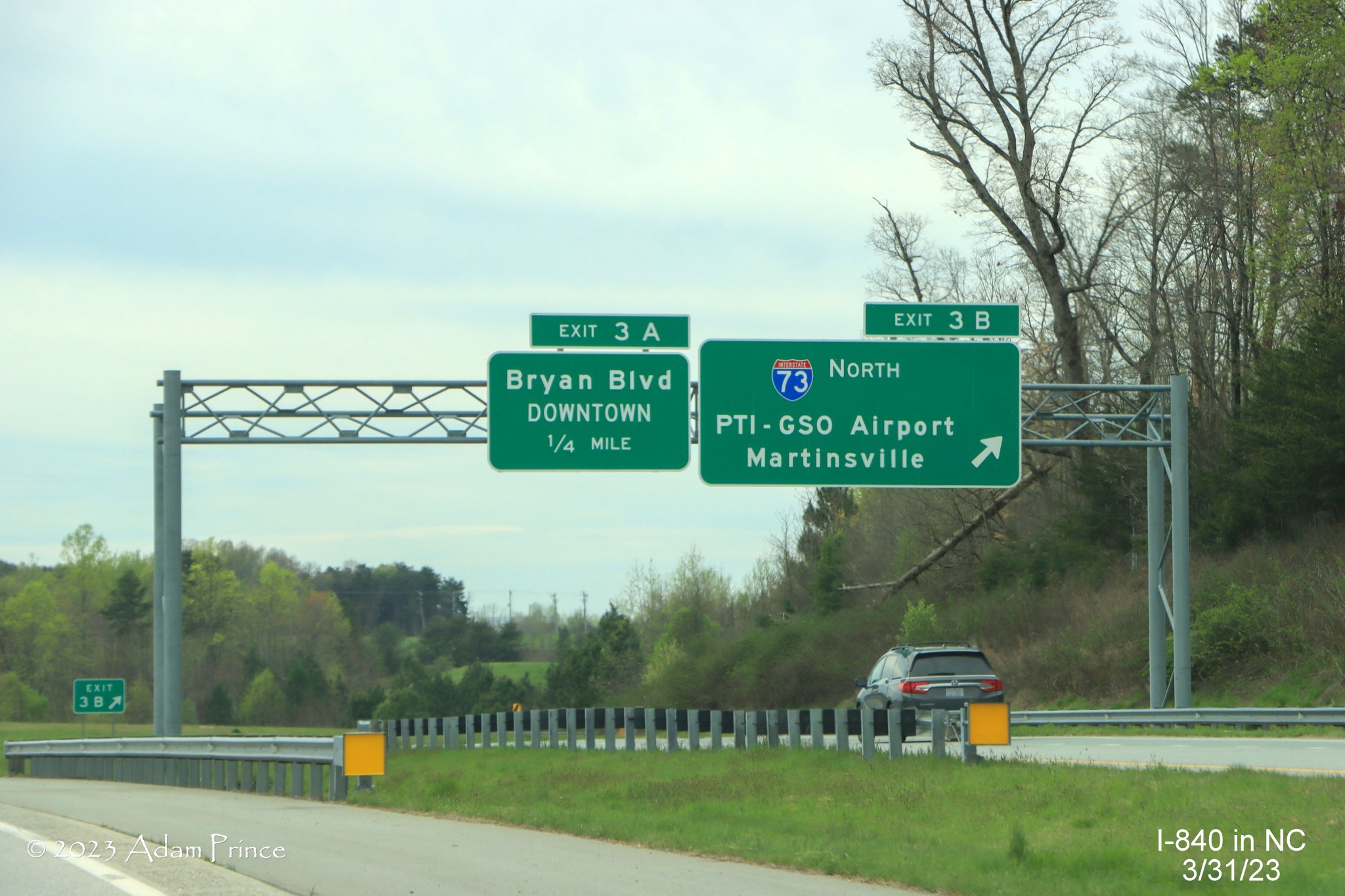 Image of overhead signs on C/D lanes for I-73/Bryan Blvd exit from I-840 West/Greensboro Loop, 
              Adam Prince,  March 2023