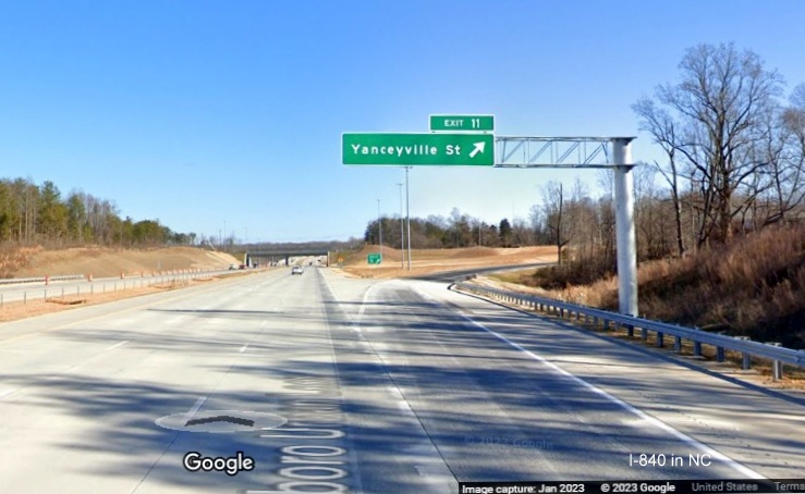 Image of overhead ramp sign for Yanceyville Street exit on I-840 East/Greensboro Urban Loop, Google Maps Street View, January 2023