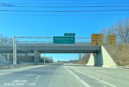 Image of 1 1/2 Mile advance overhead sign for Yanceyville Street on new section of I-840 West/Greensboro Urban Loop after the US 29 (Future I-785 North) exit, photo by Strider, January 2023